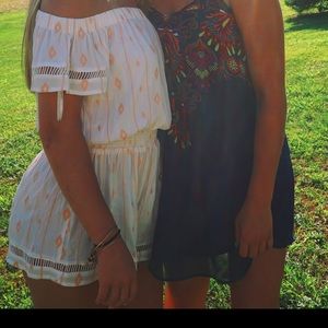 White and orange speckled romper